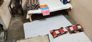 Postel nebo postele na pokoji v ubytování Sunita home stay