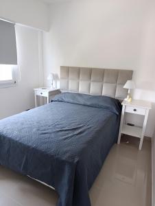 Giường trong phòng chung tại Departamento Polaris