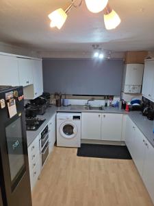 Η κουζίνα ή μικρή κουζίνα στο Private Room +7 φωτογραφίες