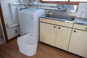 Kuchyň nebo kuchyňský kout v ubytování Furano Relax Stay C + 45 fotografií