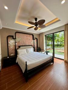 Ένα ή περισσότερα κρεβάτια σε δωμάτιο στο Cherie Villa