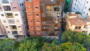 an overhead view of an apartment building in a city at Trunk and Trolley, Gachibowli, A Luxury Boutique Hotel, Hyderabad in Hyderabad