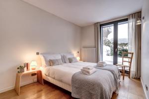 Ένα ή περισσότερα κρεβάτια σε δωμάτιο στο Chalet Safari. Face au Mont-Blanc.