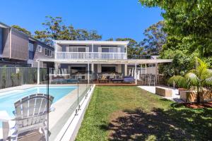 an image of a house with a swimming pool at 35 South - Pet Friendly Beach House with Pool, Spa in Vincentia