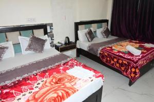 Postel nebo postele na pokoji v ubytování The Ayodhya Ji Palace