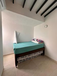 Ένα ή περισσότερα κρεβάτια σε δωμάτιο στο Casaserenapremium