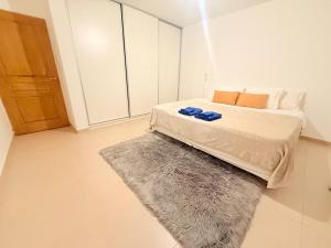 En eller flere senge i et værelse på Cordon del Velazco La Rioja