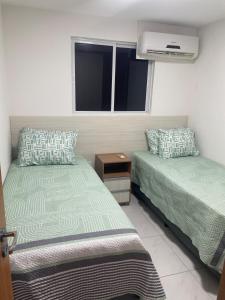 Un pat sau paturi într-o cameră la Avôhai