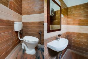 Ένα μπάνιο στο Super Collection O Patliputra Sports Complex Formerly Wellfood Inn