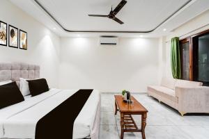 Posezení v ubytování Super Townhouse Sector 102 Noida