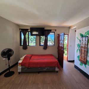 Una cama o camas en una habitación de Hotel Encuentro del Viajero