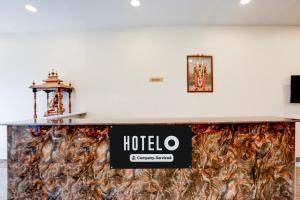 Chứng chỉ, giải thưởng, bảng hiệu hoặc các tài liệu khác trưng bày tại Hotel O Kadapa Bypass Road Formerly Sri Vasavee Grand