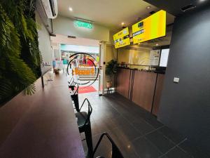 a waiting area of a restaurant with a playground at Seeds Hotel Bukit Bintang in Kuala Lumpur
