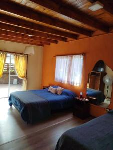 Postel nebo postele na pokoji v ubytování Casa 2 dormitorios con pileta