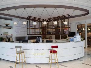 Ο χώρος του λόμπι ή της ρεσεψιόν στο Magnotel Business Jining Huancheng North Road