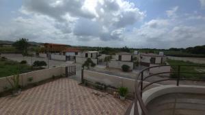 a view of a row of houses from a balcony at Aqua Dream Water Park in Bhuj