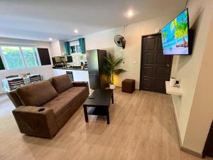 TV a/nebo společenská místnost v ubytování Lanta Sunshine Residence