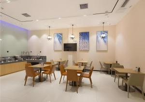 TV a/nebo společenská místnost v ubytování City Comfort Inn Liuzhou High-speed Railway Station Entrance