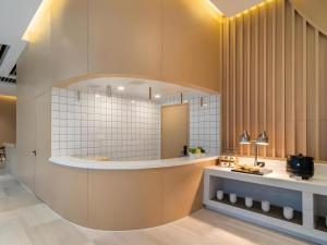 Koupelna v ubytování Deep Sleep Hotel Xuzhou High-Speed Railway Station East Square Oubeisha + 123 fotografií