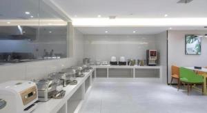Η κουζίνα ή μικρή κουζίνα στο GreenTree Inn Express Shangqiu Beihai Road South Railway Station +25 φωτογραφίες