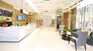 a lobby of a store with a counter and chairs at City Comfort Inn Dong'an Avenue County Government in Guzhuting