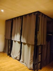 Ένα ή περισσότερα κρεβάτια σε δωμάτιο στο JAM's HOSTEL