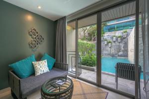 Χώρος καθιστικού στο Fusion Suites Phuket Patong
