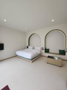 Giường trong phòng chung tại Villa38