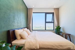 En eller flere senge i et værelse på The inner Home Apartment Hanoi + 170 billeder