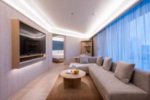 Fotografie z fotogalerie ubytování Orange Crystal Qingdao Taidong Pedestrian Street Yan'an Third Road Hotel v destinaci Čching-tao