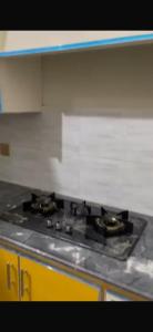 Η κουζίνα ή μικρή κουζίνα στο Khan Guest House