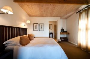 Rúm í herbergi á Leeuwenbosch Shearers Lodge - Amakhala Game Reserve