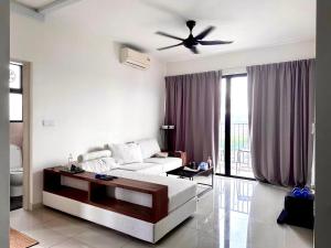 Postel nebo postele na pokoji v ubytování Tuan Residency