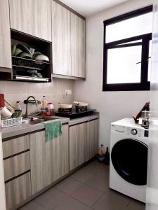 Kuchyň nebo kuchyňský kout v ubytování Tuan Residency
