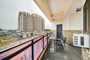 Balkón nebo terasa v ubytování Hotel O Q7 + 26 fotografií