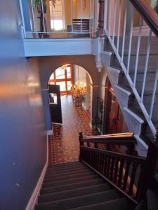 a stairway leading up to a staircase at Great Central Hotel in Glen Innes