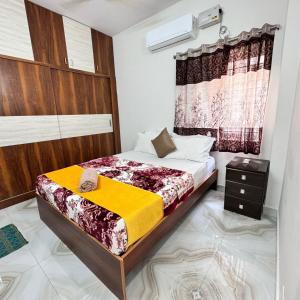 Postel nebo postele na pokoji v ubytování Sreeprada Homes
