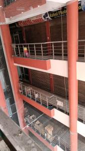 an overhead view of a building with empty stands at Hotel Laxmi Nagar in Dera Bassi