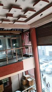 a view of a balcony from inside a building at Hotel Laxmi Nagar in Dera Bassi