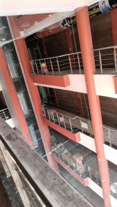 an aerial view of an apartment building with empty balconies at Hotel Laxmi Nagar in Dera Bassi