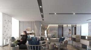 a man sitting on a couch in a living room at Symphony of The Sea Hotel in Ban Thai Don (2) +176 photos