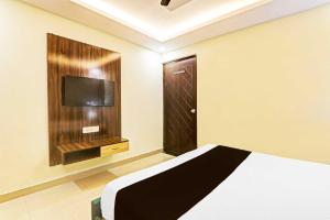 Μια τηλεόραση ή/και κέντρο ψυχαγωγίας στο Hotel O Dashashwamedh Ghat +7 φωτογραφίες