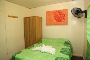 Katil atau katil-katil dalam bilik di Samoa Home