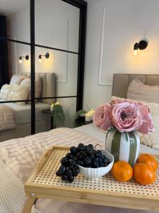 Ένα ή περισσότερα κρεβάτια σε δωμάτιο στο Apartament na Starym Mieście Lisowskiego