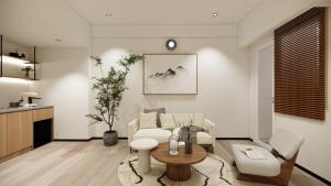 a living room with a couch and a table at Bogorienze City Resort in Pamoyanan