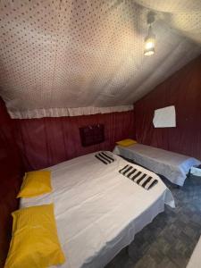 Ένα ή περισσότερα κρεβάτια σε δωμάτιο στο Nomads Retreat By SJJ +2 φωτογραφίες