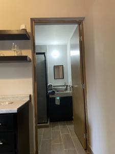 a bathroom with a sink and a mirror at LiV109 Norte Depa 7 Cd Obregon in Ciudad Obregón +35 photos