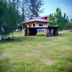 Сад в Country Club Resorts - Riverside Cottages & Suites