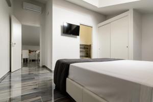 Postel nebo postele na pokoji v ubytování B&B al Palazzo