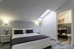 Postel nebo postele na pokoji v ubytování B&B al Palazzo